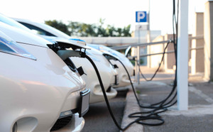 Charging modern electric cars from station outdoors