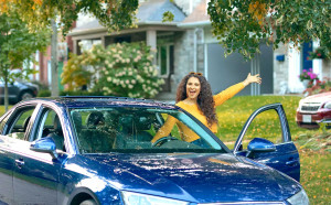 New enthusiastic buyer next to car - amazing online car deals 