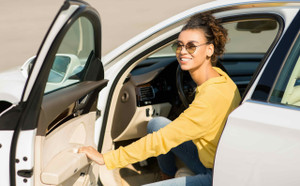 Auto ride in Luxury coupe - Happy Woman driving