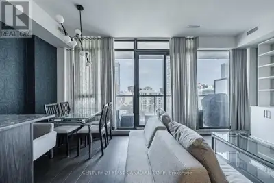 Welcome to unit 1405, this stunning 2-bedroom, 2-bathroom condo at 81 Wellesley, perfectly situated...