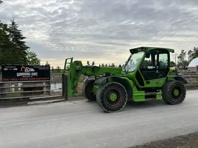 PRICE REDUCED Merlo 55.9CS Flat Free C — reach of 28' with a load of 4400 lbs or maximum load of 121...