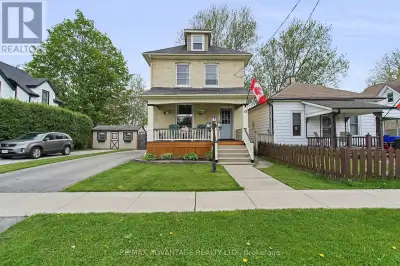 This charming and updated yellow brick century home boasts exceptional curb appeal and is set on a s...