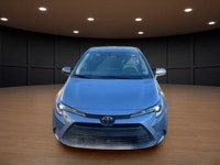 The 2023 Toyota Corolla LE in gray is a forward-thinking sedan that seamlessly marries stylish desig... (image 2)