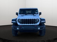 This 2025 JEEP WRANGLER 4-DOOR RUBICON has the following options Cloth Low-Back Bucket Seats, Remote... (image 6)