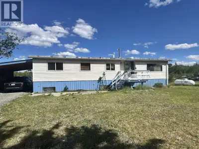 A little acreage, a big shop, and room to make it your own. Set on over 5 acres in 70 Mile House, th...