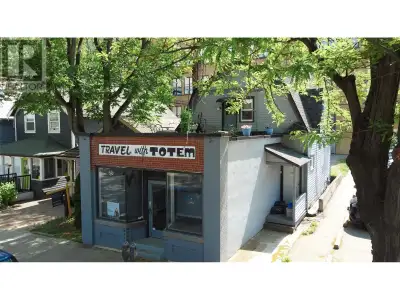 Do you want to own a boutique office space in a prime location? And live upstairs in a cute bachelor...