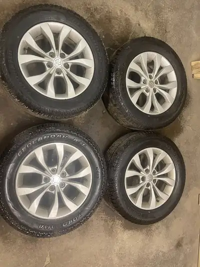 Full set of Tires and Rims off a 2013 Suzuki Grand Vitara. All Season tires are currently sitting @...