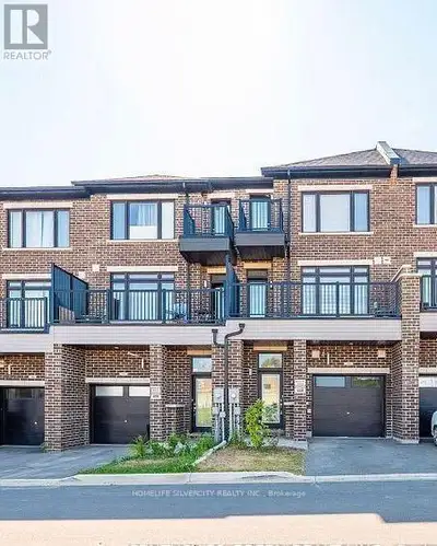 **Exceptional Live & Work Opportunity in Prime Brantford!** This modern 3-storey townhome offers the...
