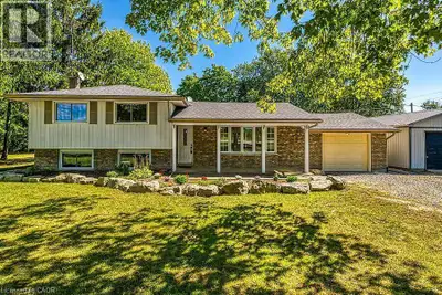 Welcome to this beautifully renovated 3-bedroom, 3-level side split home, ideally situated on a spac...