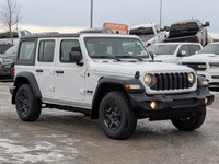 This Jeep Wrangler has a dependable Intercooled Turbo Premium Unleaded I-4 2.0 L/122 engine powering... (image 1)