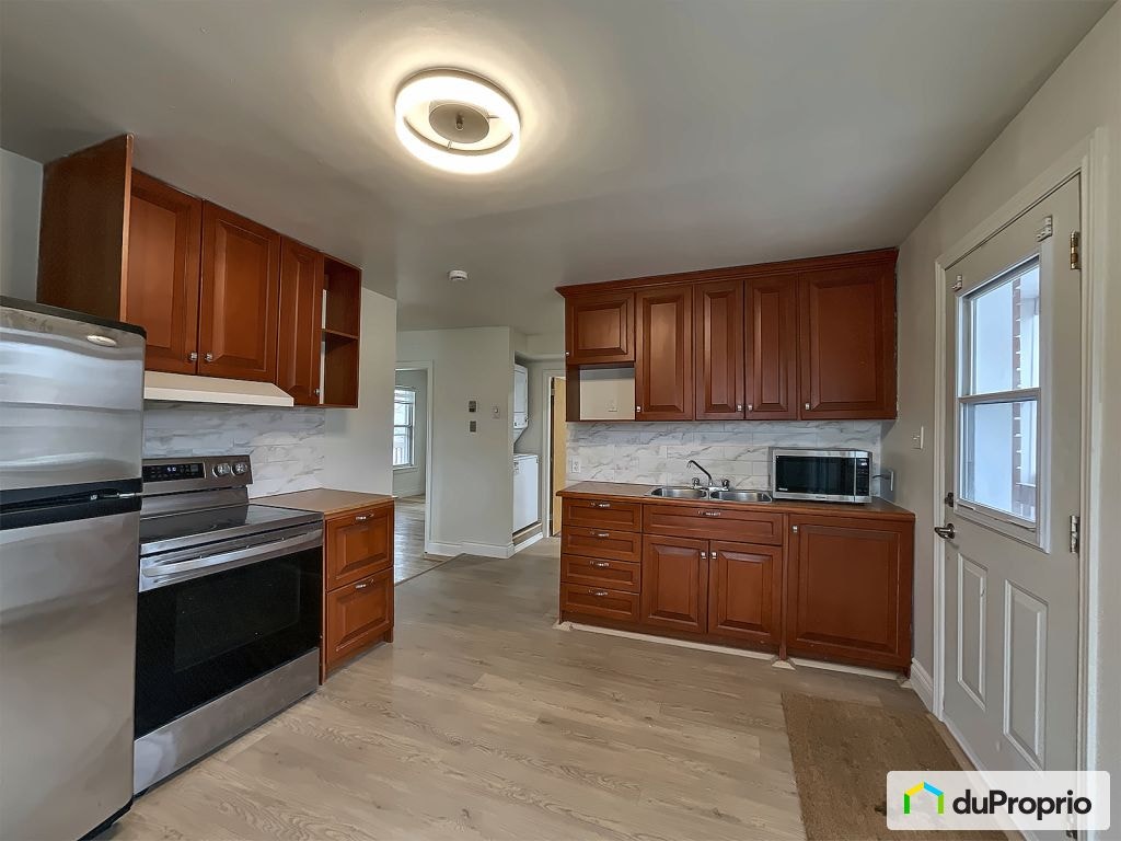 $445,900 - Duplex for sale in Sherbrooke (Fleurimont) — photo 1