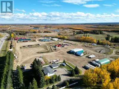 FOR LEASE! Spacious 26.46 acre commercial/industrial property located in the West end of Edson with...