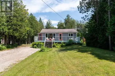 A private beach access just a two-minute walk away makes this beautifully updated cottage the perfec...