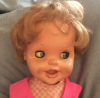 Doll makes faces