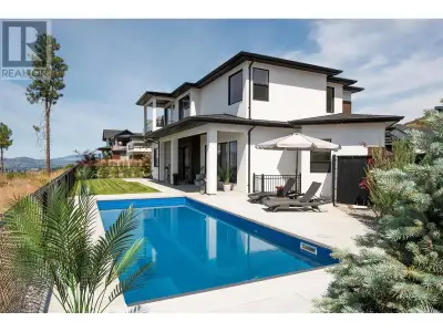 Solid built, top quality family home w/ extraordinary, 180 degree lake & city views spanning from We...