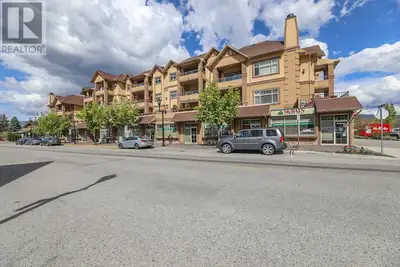 This charming corner 2-bedroom condo boasts an open concept living space with a kitchen island, elec...