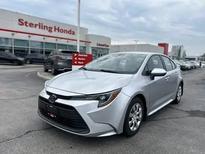Navigate your daily commute with confidence and efficiency in this impressive Silver 2024 Toyota Cor...
