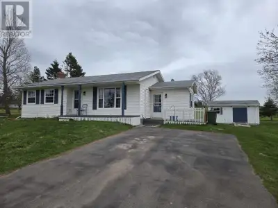 Priced to sell, 3 bedroom bungalow on a 1 acre waterfront lot with 145 ft of sandy shoreline on Rust...