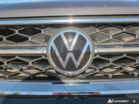 Step into the world of refinement and versatility with the 2022 Volkswagen Taos Highline 4MOTION. Cl... (image 9)