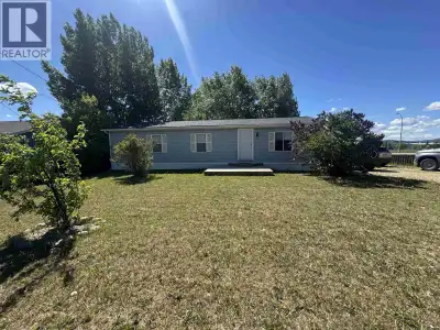 Enjoy the charm of small-town living just 10 minutes from Fort St. John in the welcoming community o...