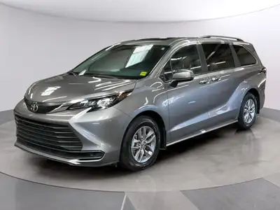 Experience the 2026 Toyota Sienna XLE, a stylish silver van designed with a front-wheel-drive system...