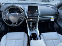 The 2025 Mitsubishi Eclipse Cross GT, with its pristine new condition, sports a bold look in strikin... (image 9)