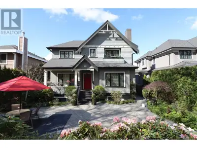 Elegant 6 bed+ den, 5 bath home in prime Shaughnessy, architect-designed with timeless style. Main f...