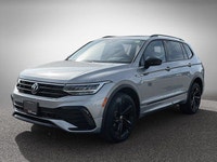 This Volkswagen Tiguan delivers a Intercooled Turbo Regular Unleaded I-4 2.0 L/121 engine powering t... (image 6)