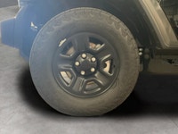Get ready to explore the great outdoors with the 2026 Jeep Wrangler Sport 2 Door 4x4, stunningly dre... (image 7)