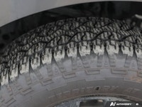 * Leather-trimmed heated and ventilated front bucket seats with a 10-way power driver's seat * 12-in... (image 9)