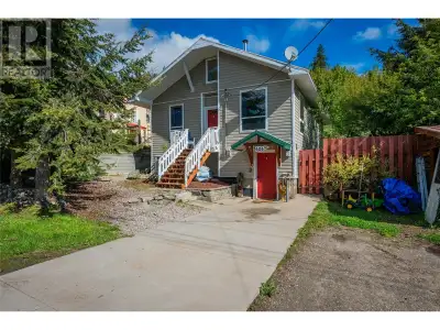 Ideally situated in the heart of Rossland, this thoughtfully designed home offers a versatile layout...
