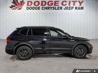 This Volkswagen Tiguan boasts a Intercooled Turbo Regular Unleaded I-4 2.0 L/121 engine powering thi... (image 6)