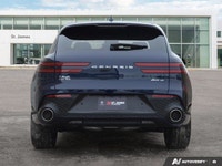 * 21-inch sport alloy wheels, dark-tinted radiator grille, unique front/rear bumpers, and large exha... (image 3)