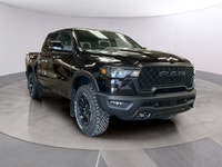 The 2026 Ram 1500 Rebel in Black, featuring a robust 4x4 drivetrain and precision handling, is ready... (image 6)