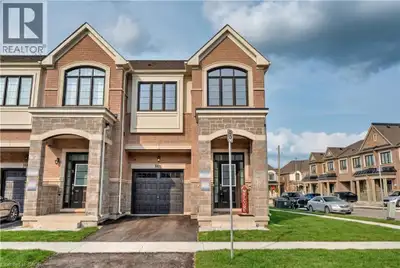 Welcome to this stunning corner lot townhome featuring four spacious bedrooms and three bathrooms, i...