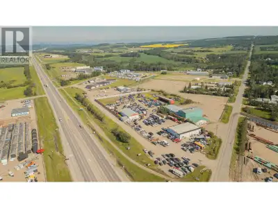 Opportunity knocks with this great investment property on Prime corner location with 14.45 Acres of...