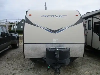 A couple’s unit with a front Murphy bed over the fold down sofa , slide w/ jack knife sofa and rear...