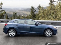 Designed for your everyday journey, this 2017 Mazda3 GX Hatchback in striking Deep Crystal Blue Mica... (image 5)