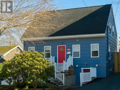 This well-designed four-bedroom Cape Cod home with a legal two-bedroom apartment offers classic char...