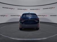Finished in blue with a black interior, this used 2021 Mazda CX-5 GT AWD brings together upscale com... (image 6)