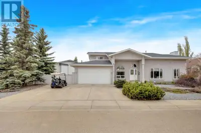 The TRIFECTA win for location in the highly sought after community of Sylvan Lake. Across from the M...