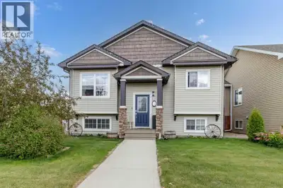 Great curb appeal is a preview of how well-maintained this legally suited property is! Close to shop...