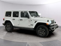 Experience the rugged charm of the new 2026 Jeep Wrangler Sahara 4 Door 4x4 in a striking white fini... (image 6)