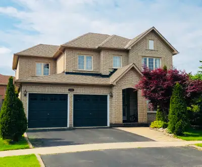Huge, Bright, and furnished master bedroom suite with a walk-in closet on the second floor, in a det...