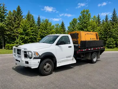 2012 Dodge 5500 Flat Deck With 375Q Air Compressor Year: 2012 Make: Dodge Model: 5500 Flat Deck Mile...