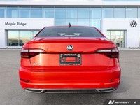 The 2019 Volkswagen Jetta Highline, presented in eye-catching Habanero Orange Metallic with a sophis... (image 3)