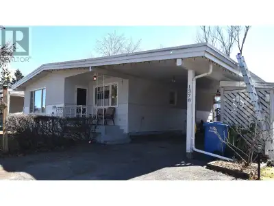* PREC - Personal Real Estate Corporation. This inviting bungalow has a spacious layout with 4 bdms,...