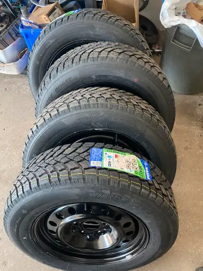Selling a set of snow tires Haida 225/65/17 mounted on 5by127 rims fits dodge caravan brand new no s...