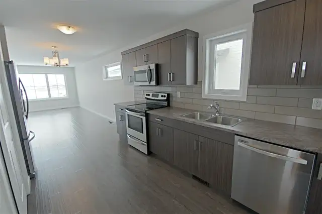 Legal 2 Bedroom Main Floor Suite (Utilities Included)