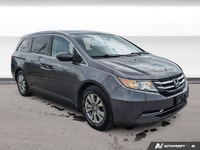 Experience the comfort and practicality of this pre-owned minivan, finished in elegant Alabaster Gre... (image 6)